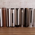 Modern Vertical Air Cooler Fans with Various Colors Displayed on Wooden Floor