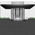 Hotel Lobby Entrance With Black Awning Central Fountain Surrounding Green Plants And Stone Pavement