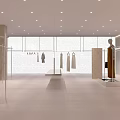Modern Clothing Store Interior With Mannequins Clothing Displays Decorative Plants And Minimalist Design