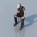 Man in White Hard Hat and Gray T-shirt Sitting on Chair Holding Tablet with Tools