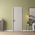 White Hinged Door In Living Room With Light Green Wall Gray Sofa And Wooden Floor