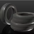 Three Car Tires Stacked and Leaning With Detailed Tread Pattern 3d model