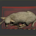 Lamb Sculpture Adorned with Cross Flag on Red Cushion and Stacked Books with Golden Medallions