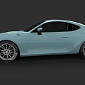 Light Blue Two Door Sports Car With Sleek Body And Silver Alloy Wheels