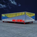 Modern Container Building With Yellow Blue Illuminated Exterior And Red Support Base