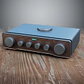 Modern Digital Audio Device With Blue Brown Design Knobs And Top Button On Wooden Table 3d model