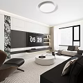 Modern Living and Dining Room With Gray Sofa White Round Coffee Table Black Accent Chair