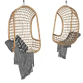 Stylish Rattan Hanging Chairs With Round Design Cushions And Gray Blankets