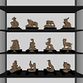 Animal Shaped Decorative Ornament Set on Black Shelves with Lit Display Arrangement