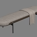 Light Beige Fabric Upholstered Bench with Black Metal Legs and Draped Knit Blanket