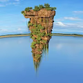 Floating Rock Formation With Green Vegetation And Water Reflection Under Blue Sky