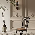 Elegant Wooden Dining Chair With Brown Cushion By Ornate Paneled Wall And Potted Plant