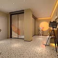 Modern Elevator Hallway With Beige Wall Recessed Lighting Long Bench Flower Bouquet And Floor Lamp