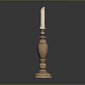 Decorative Brass Candlestick With Tall Design And Lit Candle On Black Surface