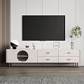 Modern White TV Stand With Drawers Circular Panel And Potted Plant Decor