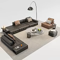 Modern Black Leather Sectional Sofa And Round Glass Coffee Table With Brown Pillows Floor Lamp
