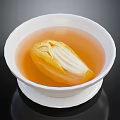 Fresh Chinese Cabbage Heart in Light Orange Soup Served in White Bowl