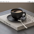 Black Coffee Cup On Black Saucer With Silver Spoon And Eat Drink Hop Book