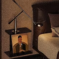 Modern Bedside Table With Sleek Table Lamp Artwork And Bed In Bedroom
