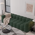 Green Sectional Sofa With Cozy Blanket Glass Coffee Table Floor Lamp And Wall Artwork