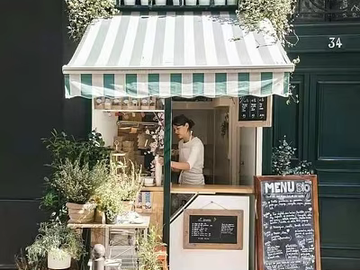 Charming Specialty Store With Green And White Striped Awning Menu Blackboard And Plants 3d model