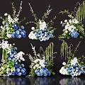 Elegant Blue And White Floral Arrangements In Vase With Green Leaves