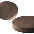 Two Dark Circular Cushions With Textured Surface And Soft Padding 3d model