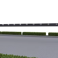 Outdoor Public Bicycle Rack With Multiple Parking Slots And Green Shrubs Near Pavement