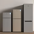 Three Modern Refrigerators in Silver Beige Colors with Different Sizes and Styles