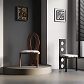 Brown Wooden Chair With Circular Backrest And Black Chair With Hole Design In Gray Room