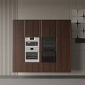 Modern Kitchen Built In Oven And Microwave Appliances In Wooden Cabinets