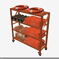 Orange Multiple Tier Storage Shelf With Lifebuoys Rope Reels And Boxes On Wheels