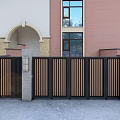 Modern Black And Wooden Entrance Gate With Vertical Slats Stone Pillars And Red Brick Building