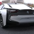 White BMW Sports Car With Sleek Front Grille And Headlights