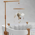 White Frame Baby Crib With Wooden Posts Gray Mattress And Hanging Mobile