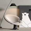 Modern White Lounge Chair With Floor Lamp And Polar Bear Painting Against Gray Wall