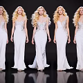 Five women wearing white long dresses with similar curly hairstyles standing at fashion show