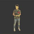 Man holding tablet in colorful striped T-shirt blue jeans and sneakers standing against gray background