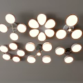 Modern Round Lighting Fixture Combination With Multiple Sizes Warm Light Wall Mounted On Gray Background