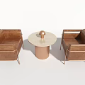 Brown Leather Single Sofa With Metal Legs And Round Coffee Table Wooden Top