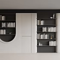 Modern White And Black Built in Bookcase With Circular Opening Holding Books And Decorative Items