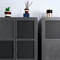 Dark Metal Cabinets With Decorative Items Green Knitted Pouf And Small Plants