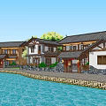 Traditional Chinese Style Residential Houses By Water With Green Plants And Stone Walls