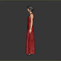 Portrait Of Elegant Woman In Red Long Dress Standing Against Gray Background