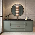 Light Green Bathroom Vanity with Black Countertop Round Mirror and Decorative Vase Candles