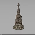 Ancient Carved Stone Tower with Ornate Base Spire and Intricate Traditional Design
