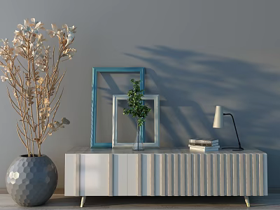Modern TV Stand Featuring Striped Design with Picture Frames Potted Plant Lamp and Books 3d model