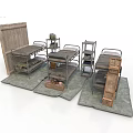 Modern Dormitory Setup With Metal Frame Bunk Beds Small Tables And Gray Mats