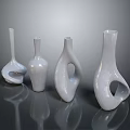 Fresh Green Plants In Stylish White Vases For Interior Home Decoration