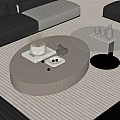 Modern Round Wooden And Black Glass Coffee Tables With Decorative Tray Vases Books And Sofa